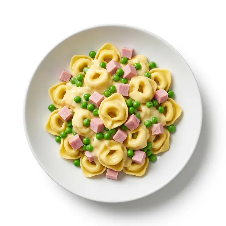 Tortellini con salsa de queso y guisantes