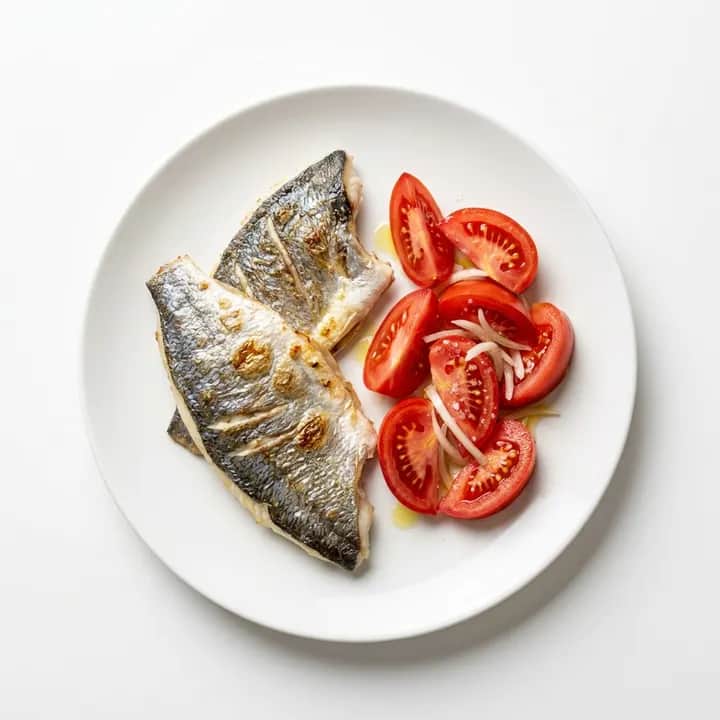 Dorada a la plancha con ensalada de tomate